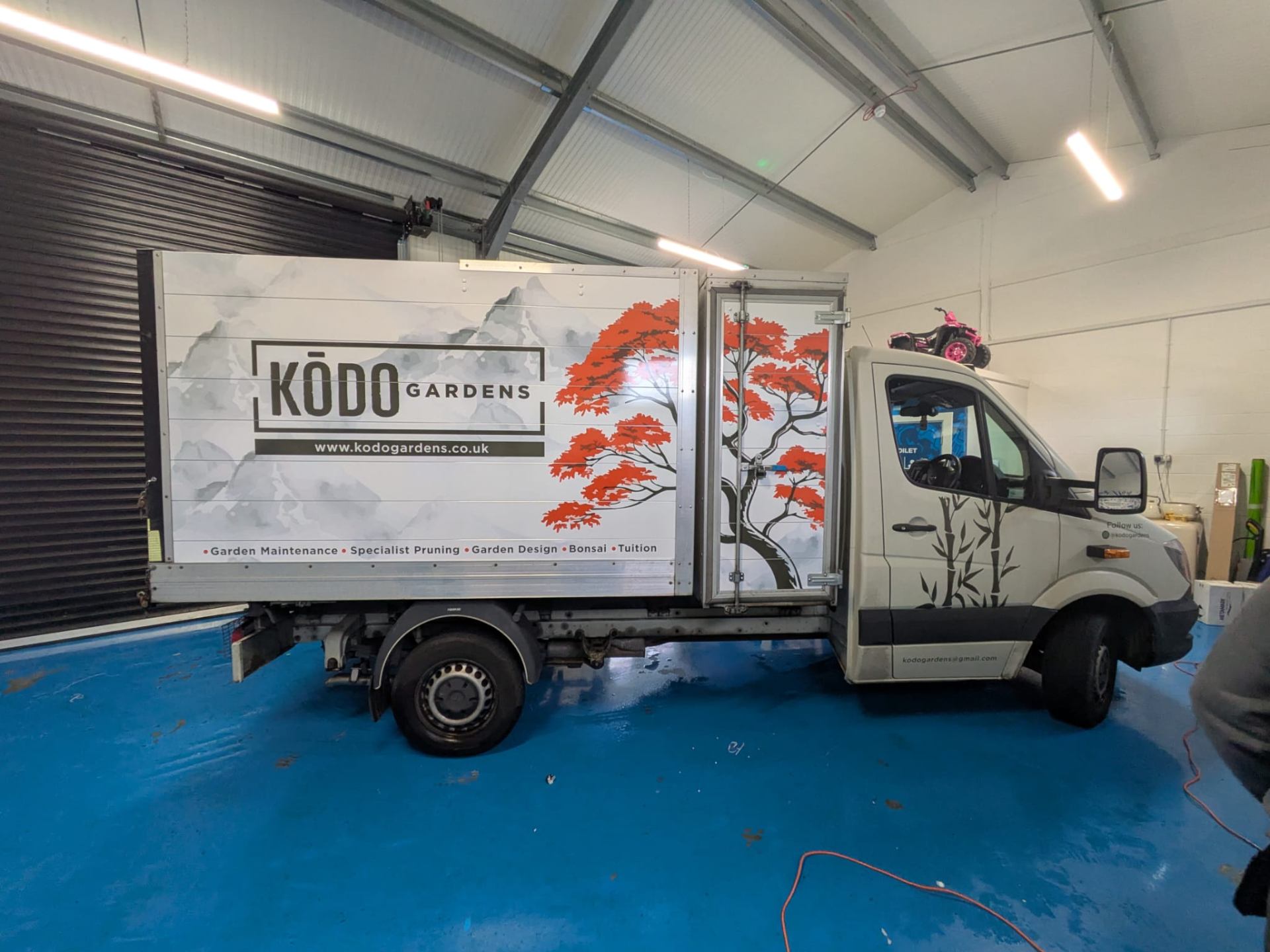 beautiful printed vinyl graphics transforming this signwritten delivery van for Kodo gardens