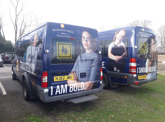 Blue minibus with large digital printed vinyl signwriting for Burgess Hill School for Girls