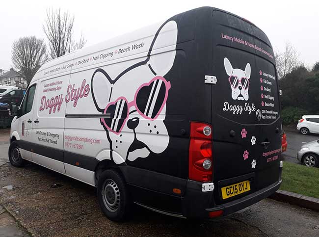 Pink & Black cut vinyl used to advertise Doggystyle Grooming van with a full coverage to rear panel