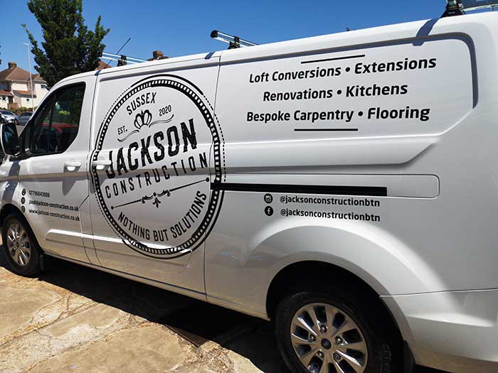 One colour black cut vinyl lettering and graphics for Jackson Construction van