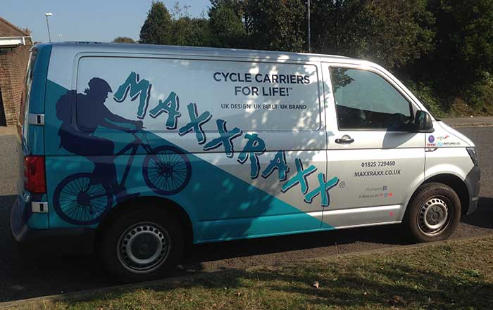 Cut vinyl letters and design for Maxx Traxx bike carriers van including full coverage rear panel doors transformation