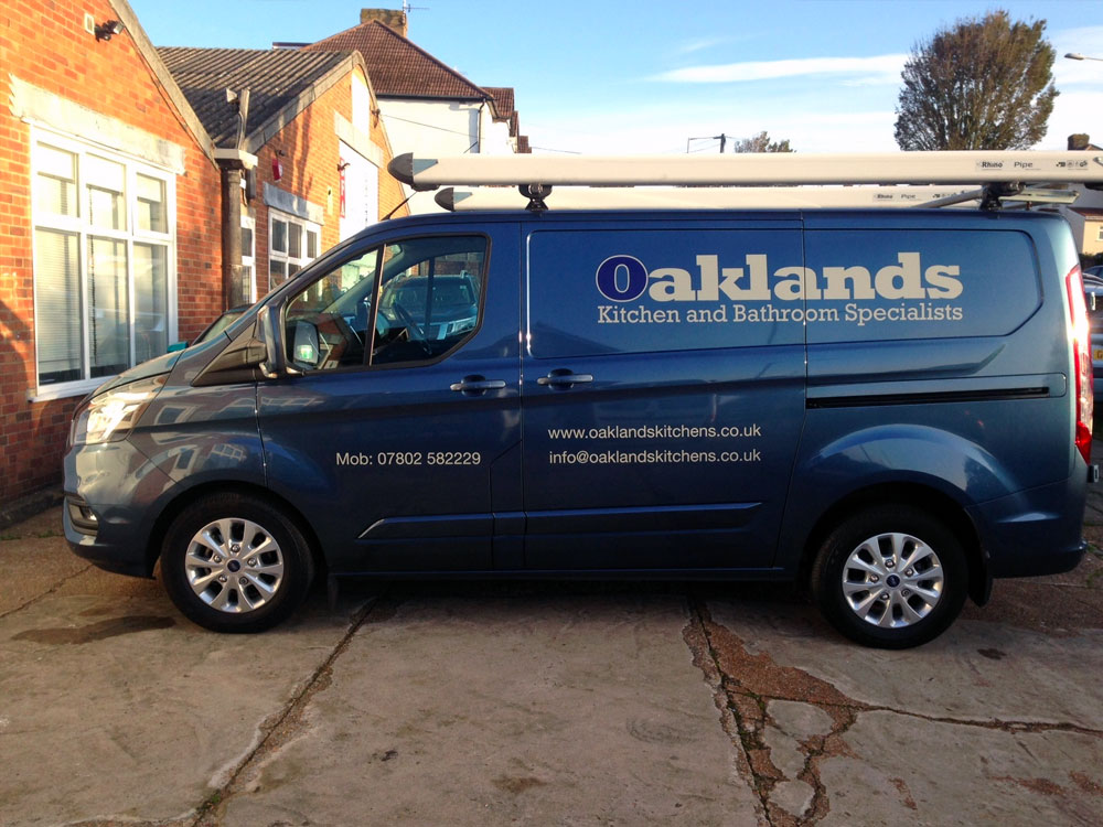 Cut vinyl letters used to promote Oaklands Kitchens and Bathrooms company van