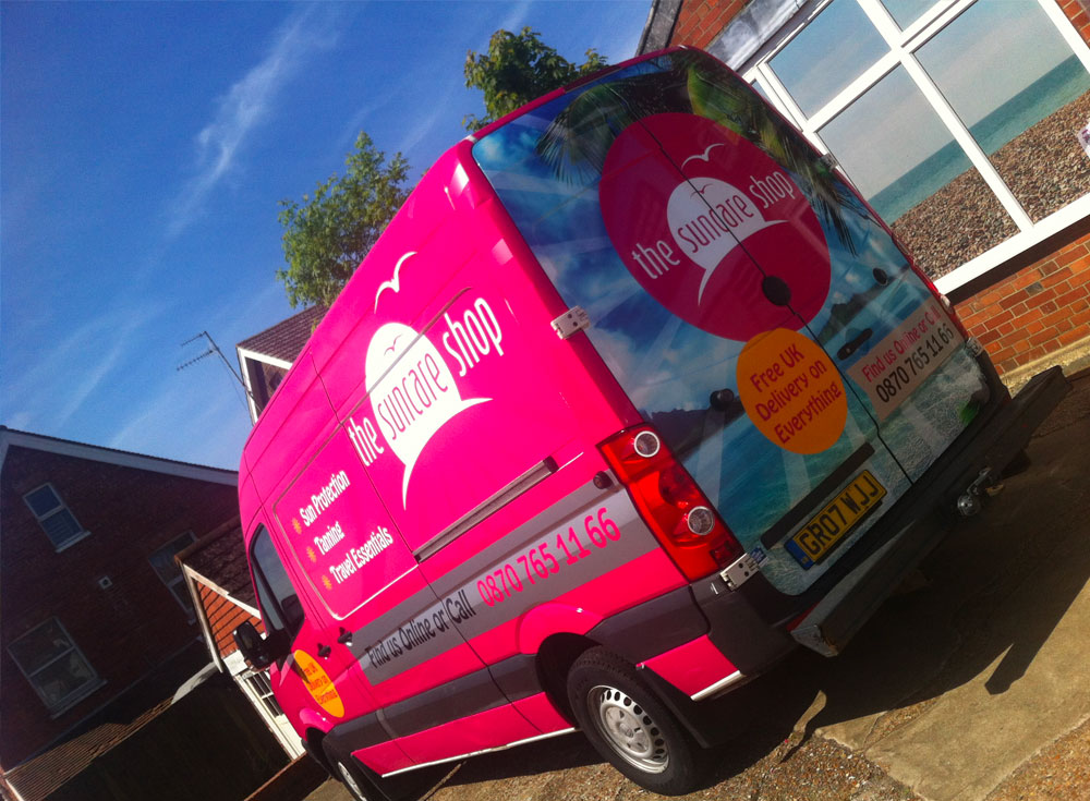 The Sun Care shop delivery van with digitally printed rear panels and vinyl letters applied to side