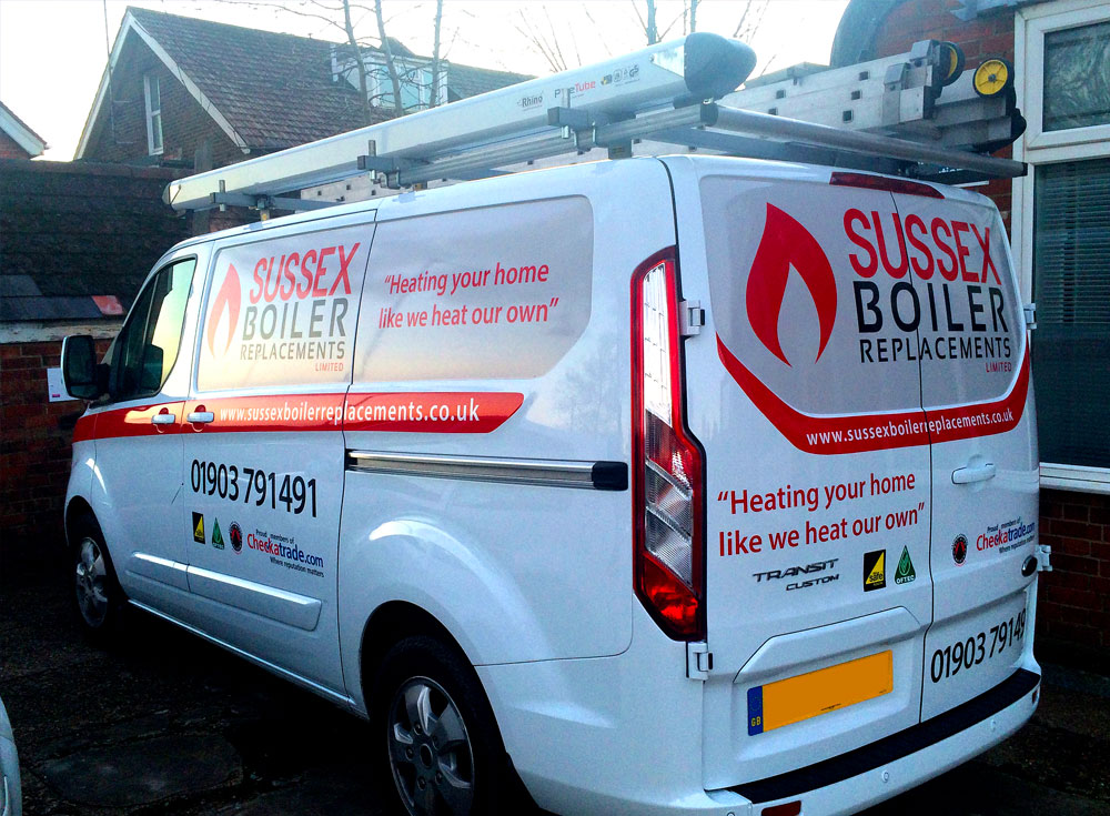 Sussex Boiler Replacements white Ford Transit signwritten with cut vinyl letters