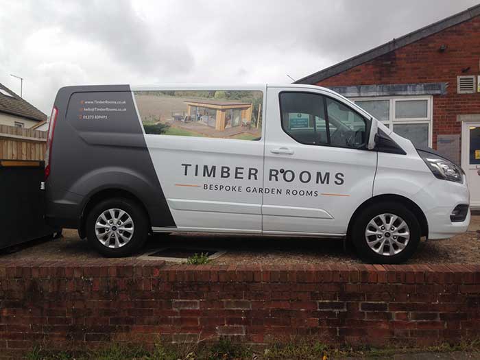 Timber Rooms delivery van with digitally printed vinyl decals plus vinyl lettering rear quarter full colour change wrap