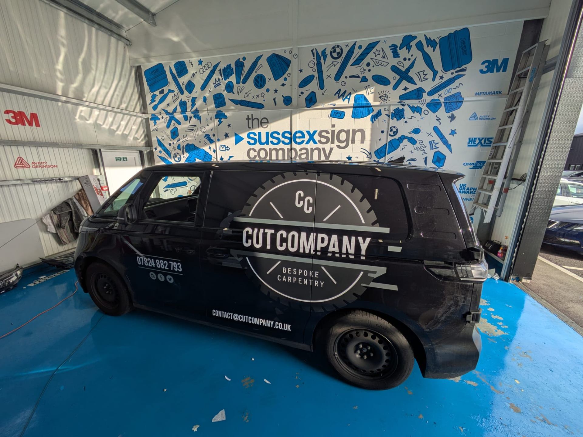 digitally printed vinyl along with cut vinyl graphics van signwriting for Cut Company Carpentry