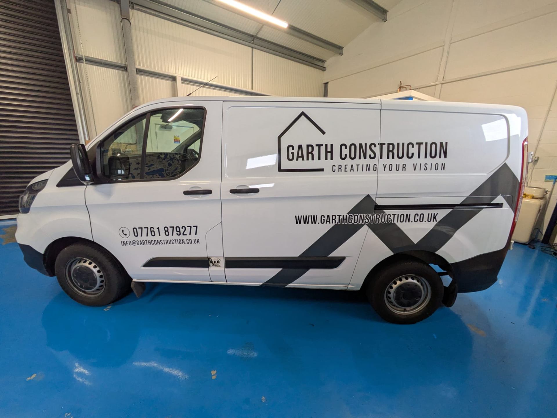 vehicle signwriting with simple one colour cut vinyl graphics for Garth Construction