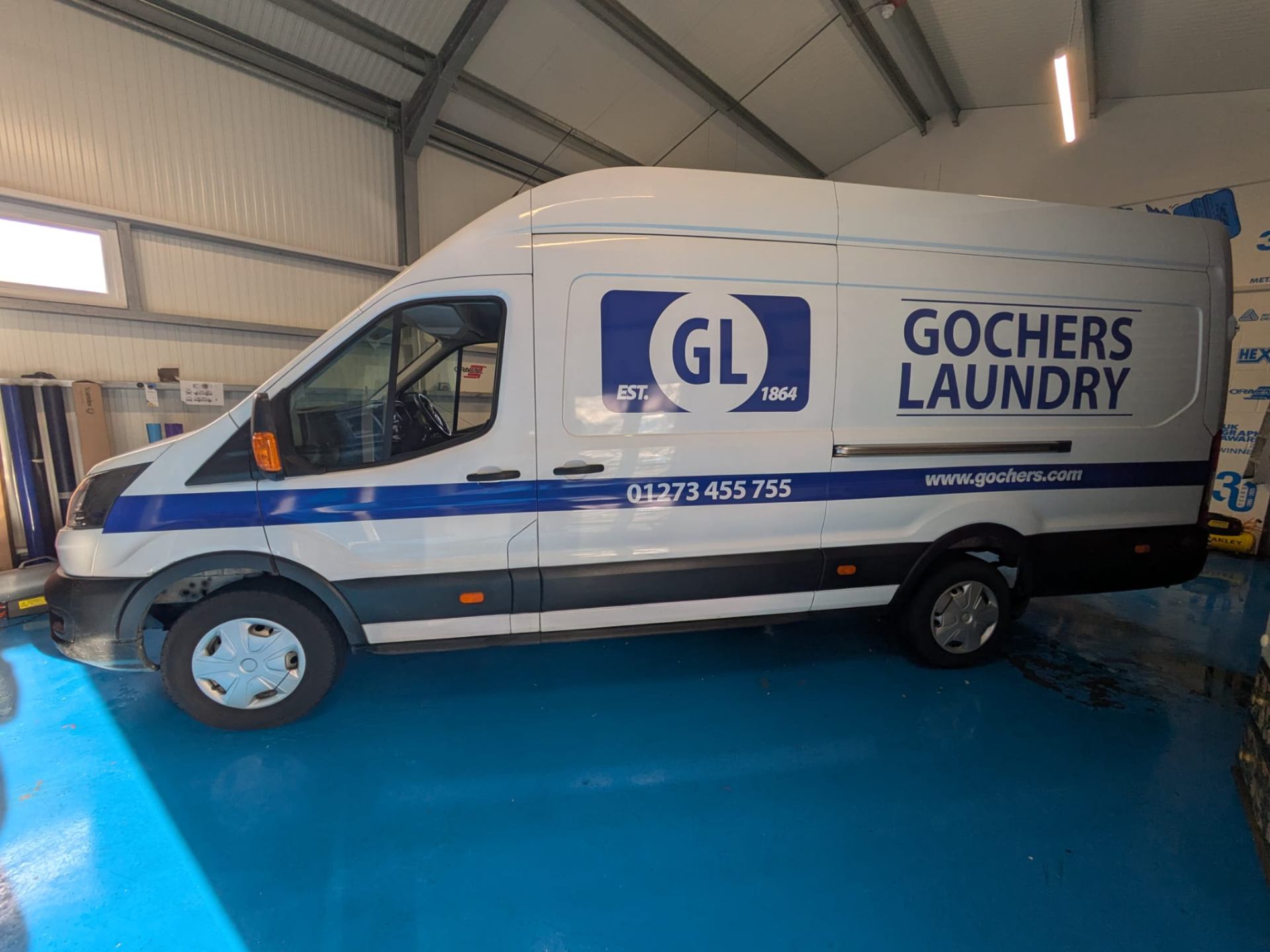 simple one colour vinyl van signwriting graphics for Gocher Laundry