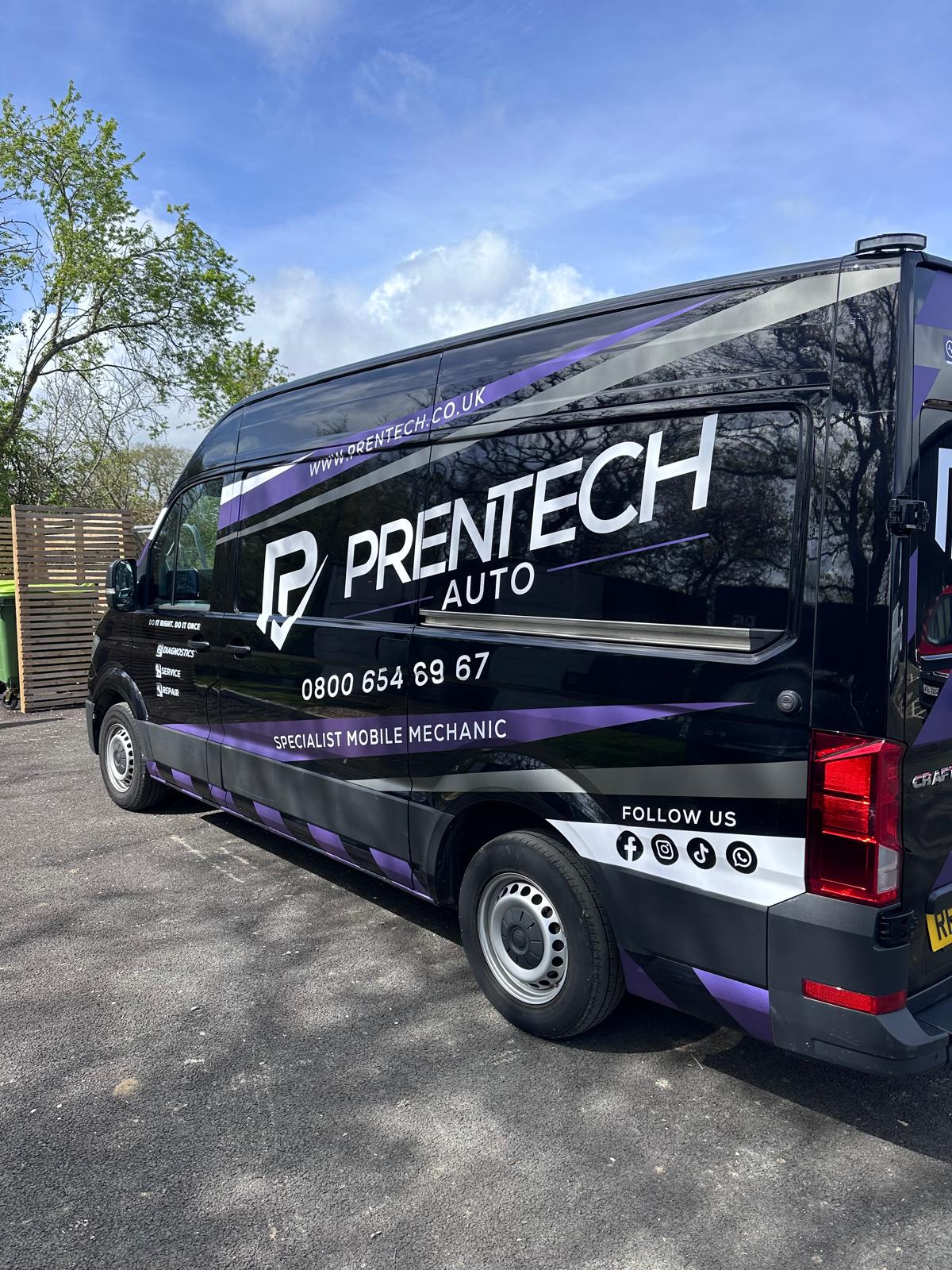 Large black VW Crafter van signwritten with three colours of cut vinyl for Prentech Auto specialist mobile mechanic