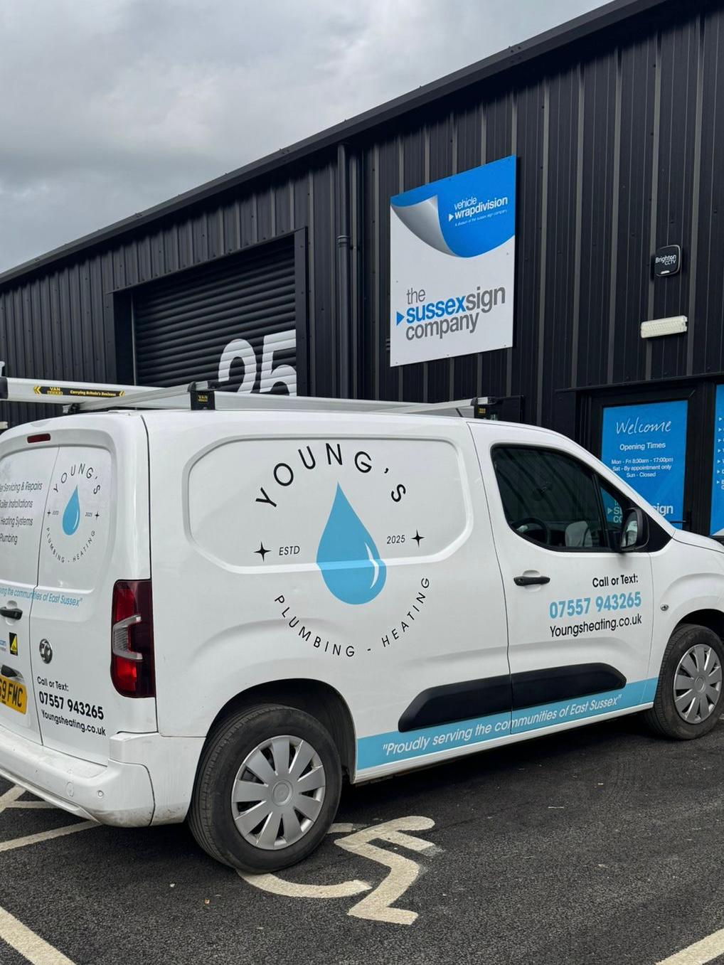 White Vauxhall Combo van with two-colour cut vinyl signwriting for Young's Plumbing and Heating, proudly serving the communities of East Sussex